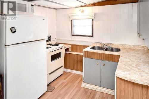 5 Andrew Street, Wahnapitae, ON - Indoor Photo Showing Kitchen With Double Sink