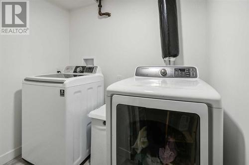 Lower level laundry room - 2055 33 Street Se, Calgary, AB 