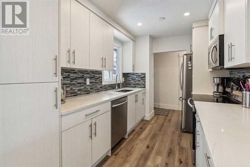 Large galley Kitchen - 2055 33 Street Se, Calgary, AB 