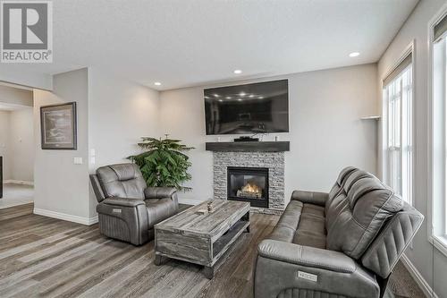 34 Mahogany Close Se, Calgary, AB - Indoor Photo Showing Living Room With Fireplace