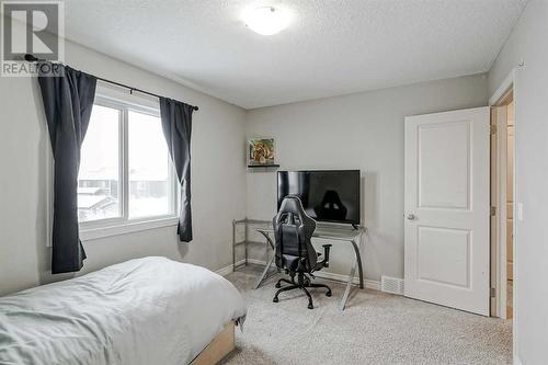 34 Mahogany Close Se, Calgary, AB - Indoor Photo Showing Bedroom