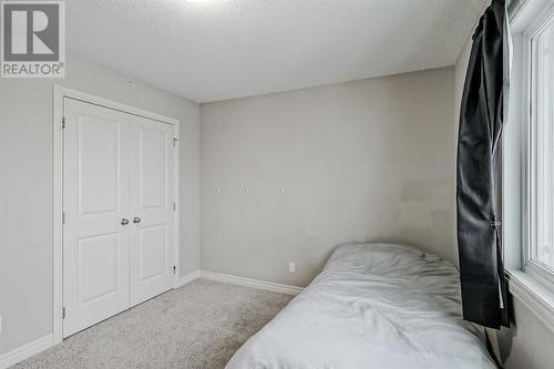 34 Mahogany Close Se, Calgary, AB - Indoor Photo Showing Bedroom