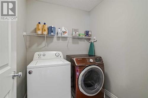 34 Mahogany Close Se, Calgary, AB - Indoor Photo Showing Laundry Room