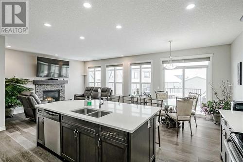 34 Mahogany Close Se, Calgary, AB - Indoor Photo Showing Other Room With Fireplace