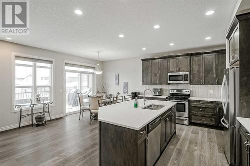 34 Mahogany Close Se, Calgary, AB - Indoor Photo Showing Kitchen With Stainless Steel Kitchen With Double Sink With Upgraded Kitchen