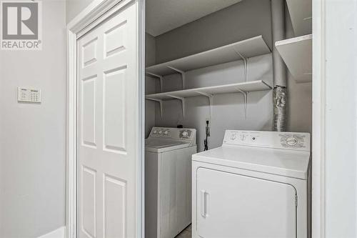 202, 219 Huntington Park Bay Nw, Calgary, AB - Indoor Photo Showing Laundry Room