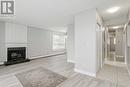 202, 219 Huntington Park Bay Nw, Calgary, AB  - Indoor With Fireplace 