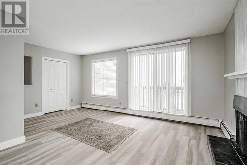 202, 219 Huntington Park Bay Nw, Calgary, AB - Indoor Photo Showing Other Room