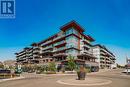 605, 122 Mahogany Centre Se, Calgary, AB  - Outdoor With Balcony With Facade 