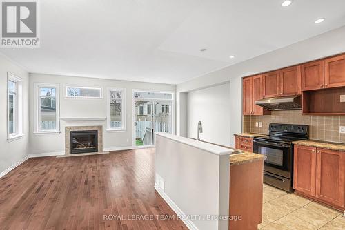 74 Madelon Drive, Ottawa, ON - Indoor Photo Showing Kitchen With Fireplace