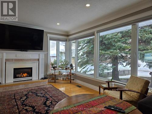 251 Lawlor Street, Temiskaming Shores (Haileybury), ON - Indoor Photo Showing Living Room With Fireplace