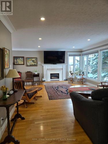 251 Lawlor Street, Temiskaming Shores (Haileybury), ON - Indoor Photo Showing Living Room With Fireplace