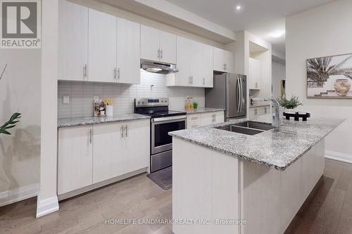 25 Hesperus Road, Vaughan, ON - Indoor Photo Showing Kitchen With Double Sink With Upgraded Kitchen