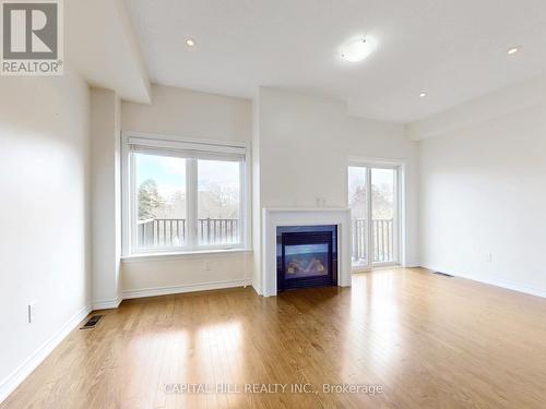 7 Pidgeon Street, Toronto, ON - Indoor Photo Showing Living Room With Fireplace