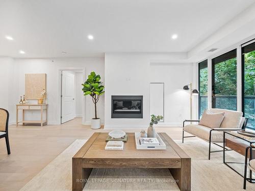 304-285 Avenue Rd, Toronto, ON - Indoor Photo Showing Other Room With Fireplace