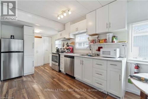 310 - 241 St. Paul Street W, St. Catharines (458 - Western Hill), ON - Indoor Photo Showing Kitchen With Double Sink