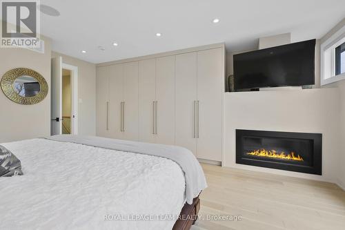 568 Edison Avenue, Ottawa, ON - Indoor Photo Showing Bedroom With Fireplace