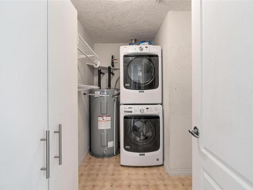 110-380 Waterfront Cres, Victoria, BC - Indoor Photo Showing Laundry Room