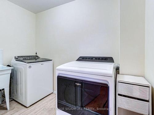 256-165 Cherokee Blvd N, Toronto, ON - Indoor Photo Showing Laundry Room