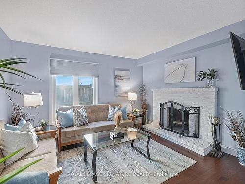 6282 Lavery Crt, Mississauga, ON - Indoor Photo Showing Living Room With Fireplace