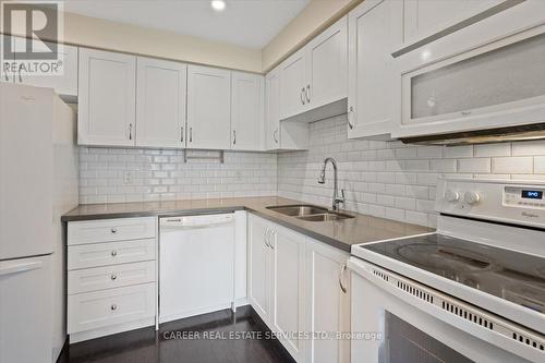 62 - 1610 Crawforth Street, Whitby (Blue Grass Meadows), ON - Indoor Photo Showing Kitchen With Double Sink