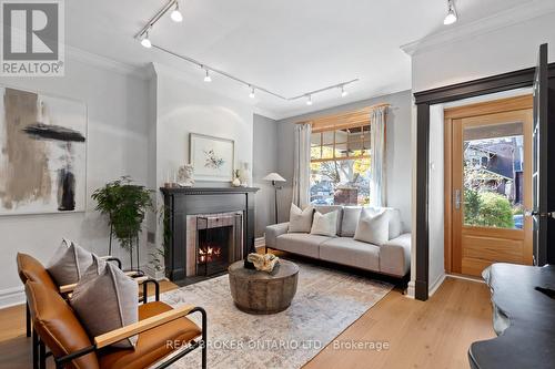 109 Glenmore Road, Toronto, ON - Indoor Photo Showing Living Room With Fireplace