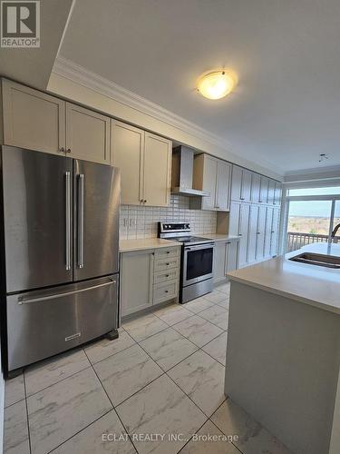 16 Toffee  (Main Floor) Trail, Hamilton, ON - Indoor Photo Showing Kitchen With Double Sink