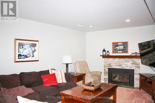 1358 Bobolink Court, Peterborough, ON - Indoor Photo Showing Living Room With Fireplace