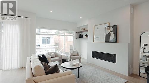 7920 Kidston Road Unit# 16, Coldstream, BC - Indoor Photo Showing Living Room With Fireplace