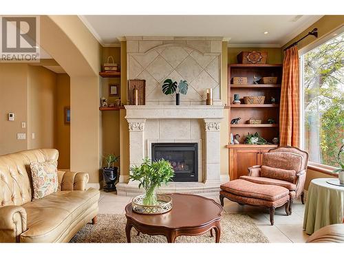 683 Westside Road S, West Kelowna, BC - Indoor Photo Showing Living Room With Fireplace