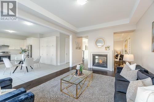 7 Malaspina Close, Brampton, ON - Indoor Photo Showing Living Room With Fireplace