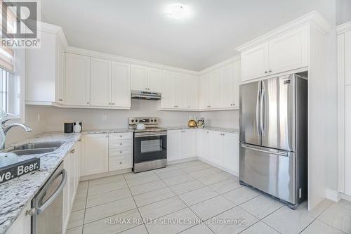 7 Malaspina Close, Brampton, ON - Indoor Photo Showing Kitchen With Double Sink