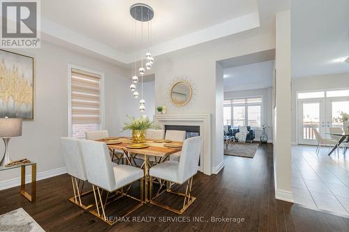 7 Malaspina Close, Brampton, ON - Indoor Photo Showing Dining Room With Fireplace