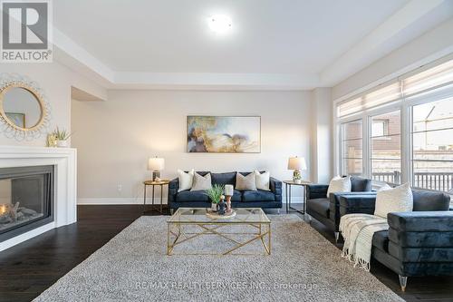 7 Malaspina Close, Brampton, ON - Indoor Photo Showing Living Room With Fireplace