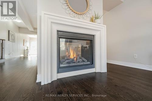 7 Malaspina Close, Brampton, ON - Indoor Photo Showing Other Room With Fireplace