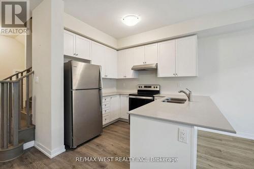 37 - 7789 Kalar Road, Niagara Falls, ON - Indoor Photo Showing Kitchen With Stainless Steel Kitchen With Double Sink