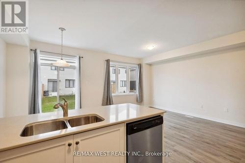 37 - 7789 Kalar Road, Niagara Falls, ON - Indoor Photo Showing Kitchen With Double Sink