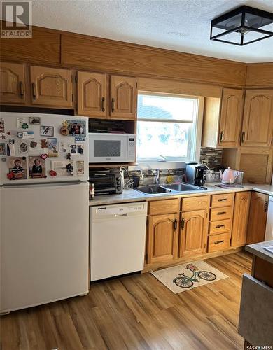 201 3140 Louise Street, Saskatoon, SK - Indoor Photo Showing Kitchen With Double Sink