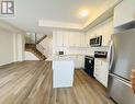 102 - 1565 Rose Way, Milton, ON  - Indoor Photo Showing Kitchen With Stainless Steel Kitchen 