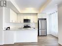 102 - 1565 Rose Way, Milton, ON  - Indoor Photo Showing Kitchen With Stainless Steel Kitchen 