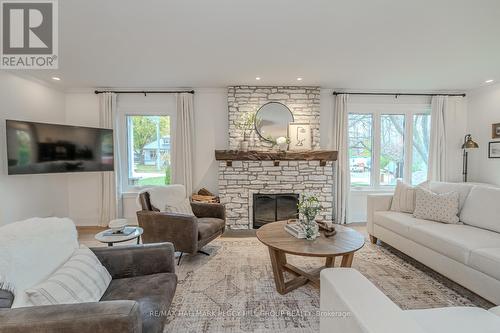 68 Dundonald Street, Barrie, ON - Indoor Photo Showing Living Room With Fireplace