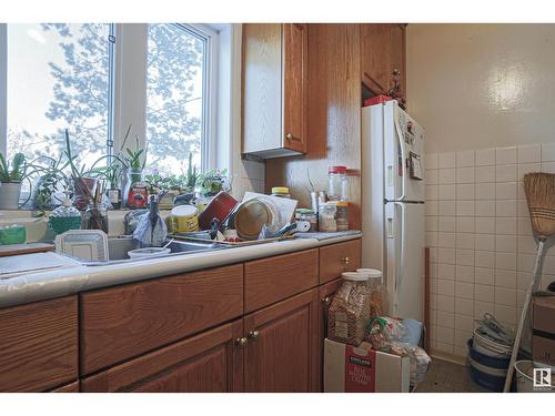 11219 104 St Nw, Edmonton, AB - Indoor Photo Showing Kitchen With Double Sink