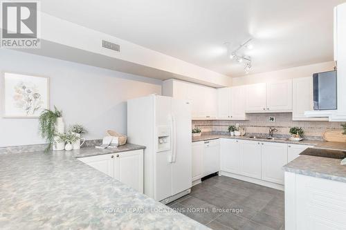 205 - 4 Beck Boulevard, Penetanguishene, ON - Indoor Photo Showing Kitchen With Double Sink