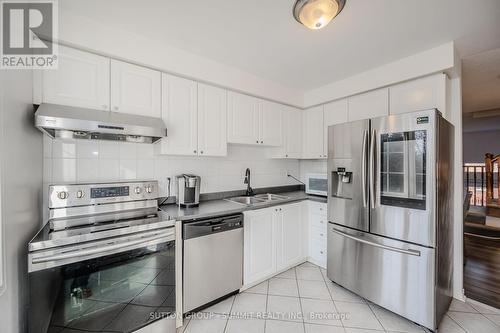 6 - 6060 Snowy Owl Crescent, Mississauga, ON - Indoor Photo Showing Kitchen With Stainless Steel Kitchen With Double Sink