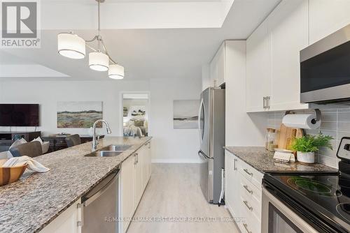 114 - 670 Gordon Street, Whitby (Port Whitby), ON - Indoor Photo Showing Kitchen With Double Sink With Upgraded Kitchen