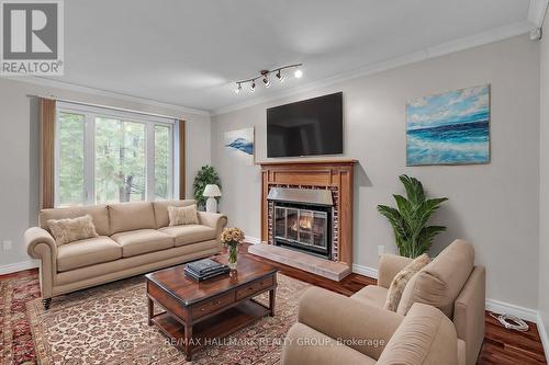 1660 Des Broussailles Terrace, Ottawa, ON - Indoor Photo Showing Living Room With Fireplace