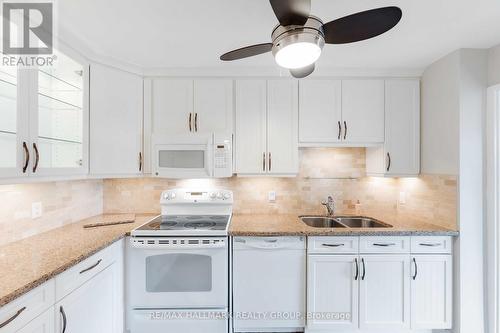 311 - 1505 Baseline Road, Ottawa, ON - Indoor Photo Showing Kitchen With Double Sink