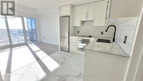 3124 - 275 Village Green Square, Toronto, ON - Indoor Photo Showing Kitchen With Upgraded Kitchen