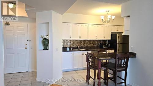 303 - 7378 Yonge Street E, Vaughan, ON - Indoor Photo Showing Kitchen