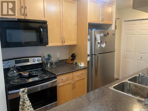 306 1435 Embassy Drive, Saskatoon, SK - Indoor Photo Showing Kitchen With Stainless Steel Kitchen With Double Sink